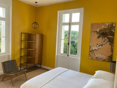 Un ou plusieurs lits dans un hébergement de l'établissement Villa Paignon