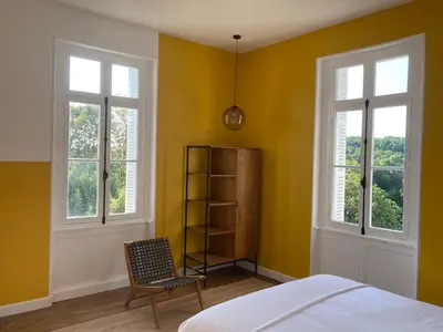 Un ou plusieurs lits dans un hébergement de l'établissement Villa Paignon
