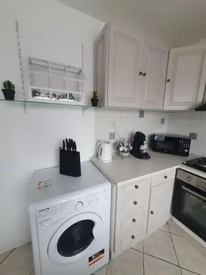 Cuisine ou kitchenette dans l'établissement Maison à Poitiers - Futuroscope
