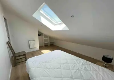 Un ou plusieurs lits dans un hébergement de l'établissement Maison hyper centre 3 chambres