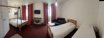 Un ou plusieurs lits dans un hébergement de l'établissement Agape Hotel Niort- Bessines