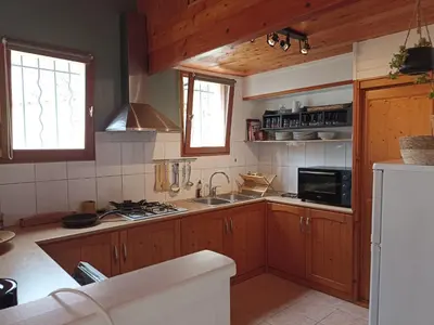 Cuisine ou kitchenette dans l'établissement Gîte de la cour