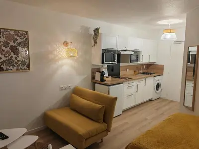 Cuisine ou kitchenette dans l'établissement Échappée Cosy au Cœur du Futuroscope - Confort Assurés