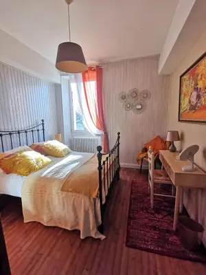 Un ou plusieurs lits dans un hébergement de l'établissement 'Quelle Belle Vue' Chambre d'Hote