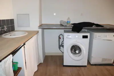 Cuisine ou kitchenette dans l'établissement COSA SARA