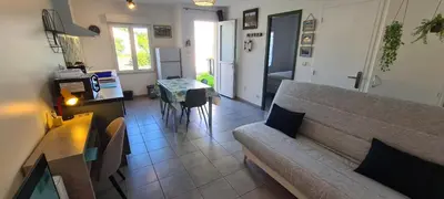 Coin salon dans l'établissement Les Sablines - Maisons T2 à 700m de l'océan - Terrasse et parking