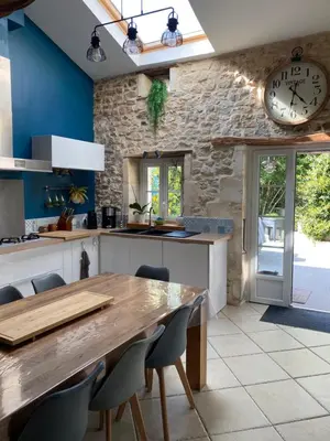 Cuisine ou kitchenette dans l'établissement Les 5 timbres