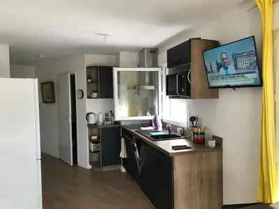 Cuisine ou kitchenette dans l'établissement Le Lodge Park à La Rochelle