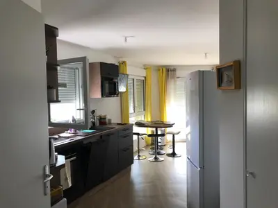 Cuisine ou kitchenette dans l'établissement Le Lodge Park à La Rochelle