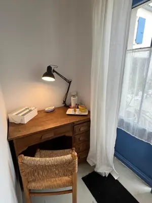 Coin salon dans l'établissement Le Clos de Flo