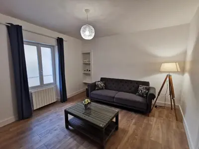 Coin salon dans l'établissement Appartement centre ville, parking gratuit