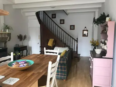 Coin salon dans l'établissement Le Petit Maison