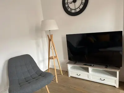 Télévision ou salle de divertissement dans l'établissement Charmante charentaise