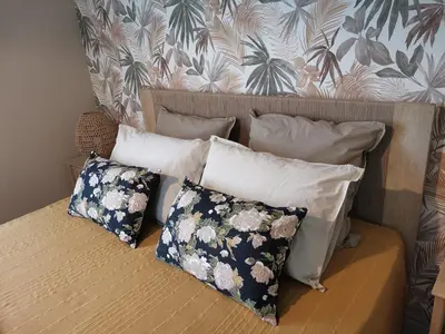Un ou plusieurs lits dans un hébergement de l'établissement Gîte - Chambres d'Hôtes La Belle Hélène