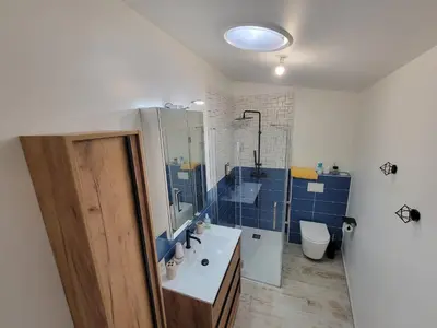 Salle de bains dans l'établissement Les Pertuis Rochelais