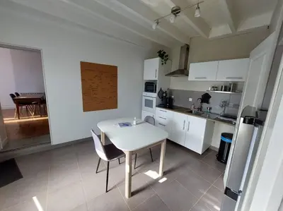 Cuisine ou kitchenette dans l'établissement La maisonnette du marais