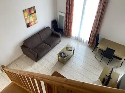 Coin salon dans l'établissement Résidence services Les Solimarines Sainte Soulle