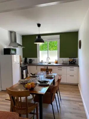 Cuisine ou kitchenette dans l'établissement Le Cinquième