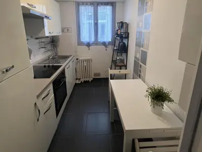 Cuisine ou kitchenette dans l'établissement Le P'tit Gris