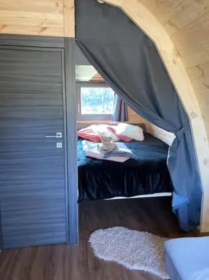 Un ou plusieurs lits dans un hébergement de l'établissement Chalet Suédois cocooning