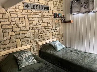 Coin salon dans l'établissement Charmant petit dortoir 3 places