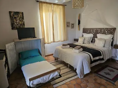 Un ou plusieurs lits dans un hébergement de l'établissement Chambre d'Hôtes LES ROCHES