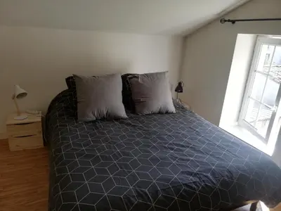 Un ou plusieurs lits dans un hébergement de l'établissement La petite maison