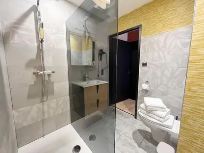Salle de bains dans l'établissement Le 240b #1