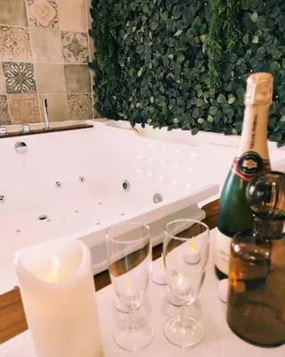 Boissons dans l'établissement La Cabana Agréable logement avec Jacuzzi/Balnéo