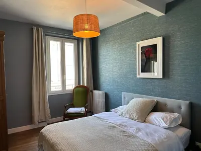 Un ou plusieurs lits dans un hébergement de l'établissement Central village house in Bussiere Poitevine