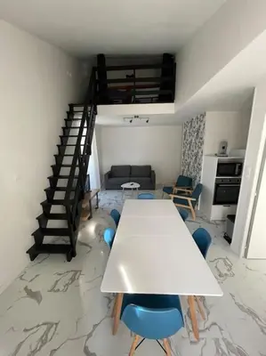 Coin salon dans l'établissement Appartement vue sur la Charente