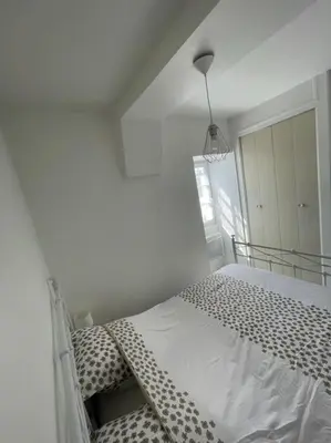 Un ou plusieurs lits dans un hébergement de l'établissement Appartement vue sur la Charente