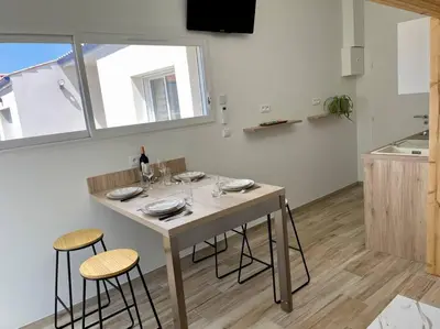 Cuisine ou kitchenette dans l'établissement Studio indépendant 4 personnes