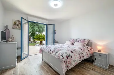 Un ou plusieurs lits dans un hébergement de l'établissement Villa Boyard - Pour 10 avec piscine privée et jacuzzi
