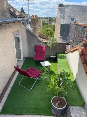 Jardin de l'établissement So British ! Appart atypique et sa petite terrasse