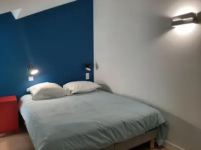 Un ou plusieurs lits dans un hébergement de l'établissement La Maison d'Albert et Julia à 12 mn du Futuroscope