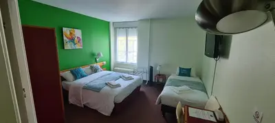 Un ou plusieurs lits dans un hébergement de l'établissement Le 120 - Groupe Logis Hotels - Ex Auberge la Terrasse
