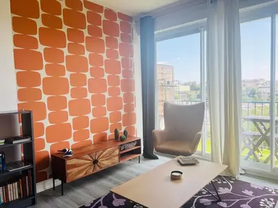 Coin salon dans l'établissement Le Rétro - Splendide appartement