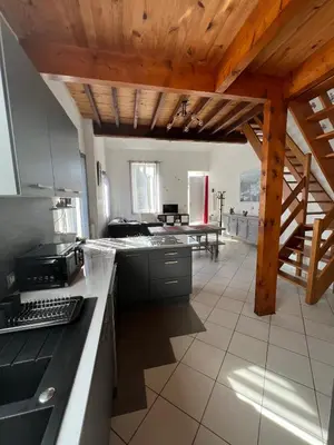 Cuisine ou kitchenette dans l'établissement La Petite Angerienne