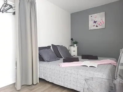 Un ou plusieurs lits dans un hébergement de l'établissement L'Appart Sud Vendée