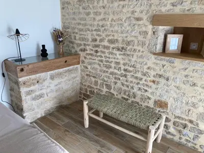 Coin salon dans l'établissement Chambre d’hôtes de la Source