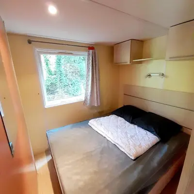 Un ou plusieurs lits dans un hébergement de l'établissement Camping Margot