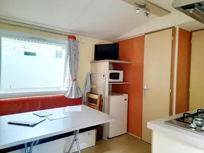 Cuisine ou kitchenette dans l'établissement Camping Margot