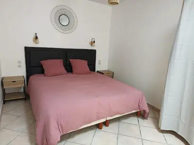 Un ou plusieurs lits dans un hébergement de l'établissement Maison de vacances en plein cœur de Châtelaillon-Plage