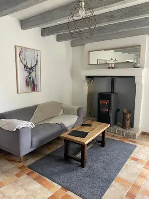 Coin salon dans l'établissement Gîte de charme La Pocterie