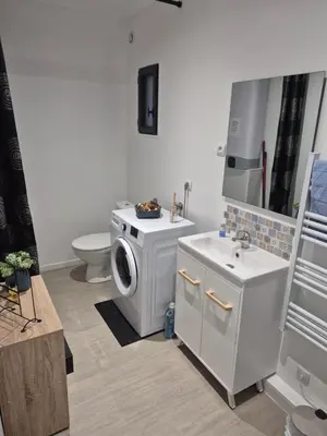Salle de bains dans l'établissement Le Colibri
