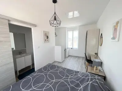 Un ou plusieurs lits dans un hébergement de l'établissement 180B - Duplex T2 Tout Confort - Wifi Netflix