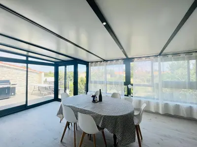 Coin salon dans l'établissement Le Cottage - Jolie Maison à Buxerolles