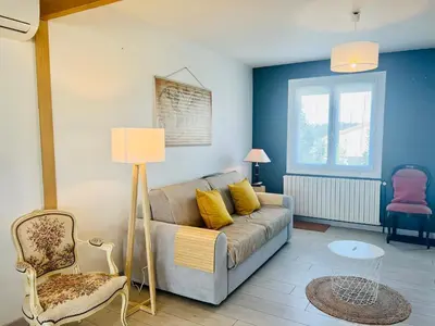 Coin salon dans l'établissement Le Cottage - Jolie Maison à Buxerolles