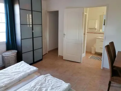 Un ou plusieurs lits dans un hébergement de l'établissement Villa with garden near beautiful golf course